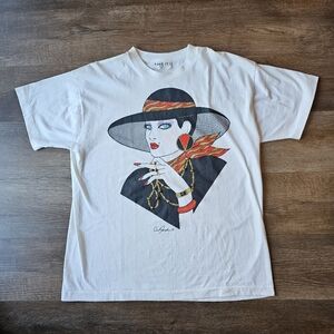 Chic Graphic Tee with Gold and Red Accents